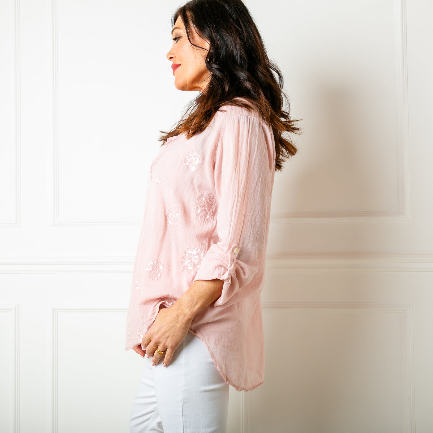 The dusky pink Sheer Sequin Blouse featuring beautiful floral sparkly sequin detailing across the front of the body